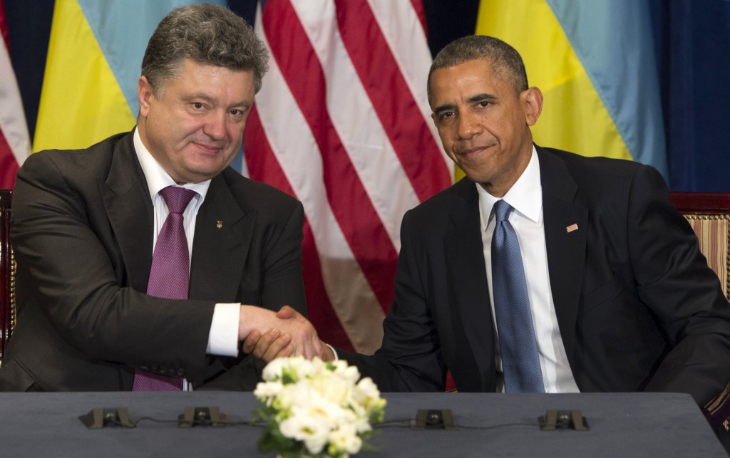 Two men shaking hands

Description automatically generated with medium confidence