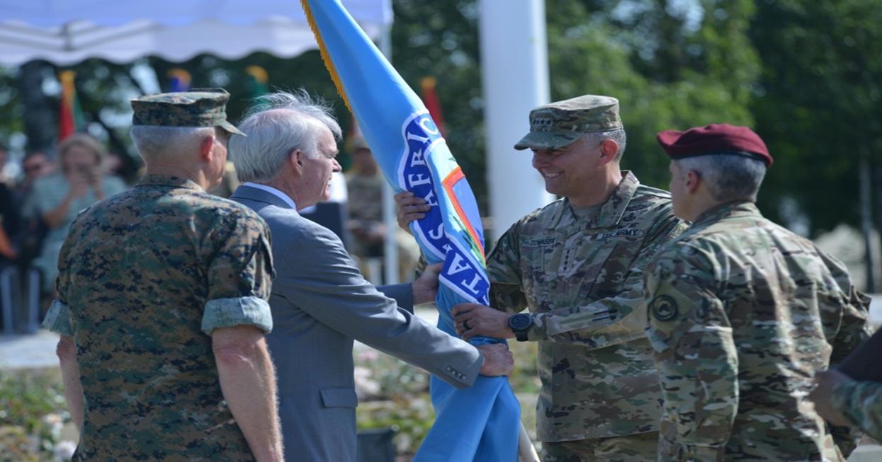A picture containing person, outdoor, military uniform

Description automatically generated