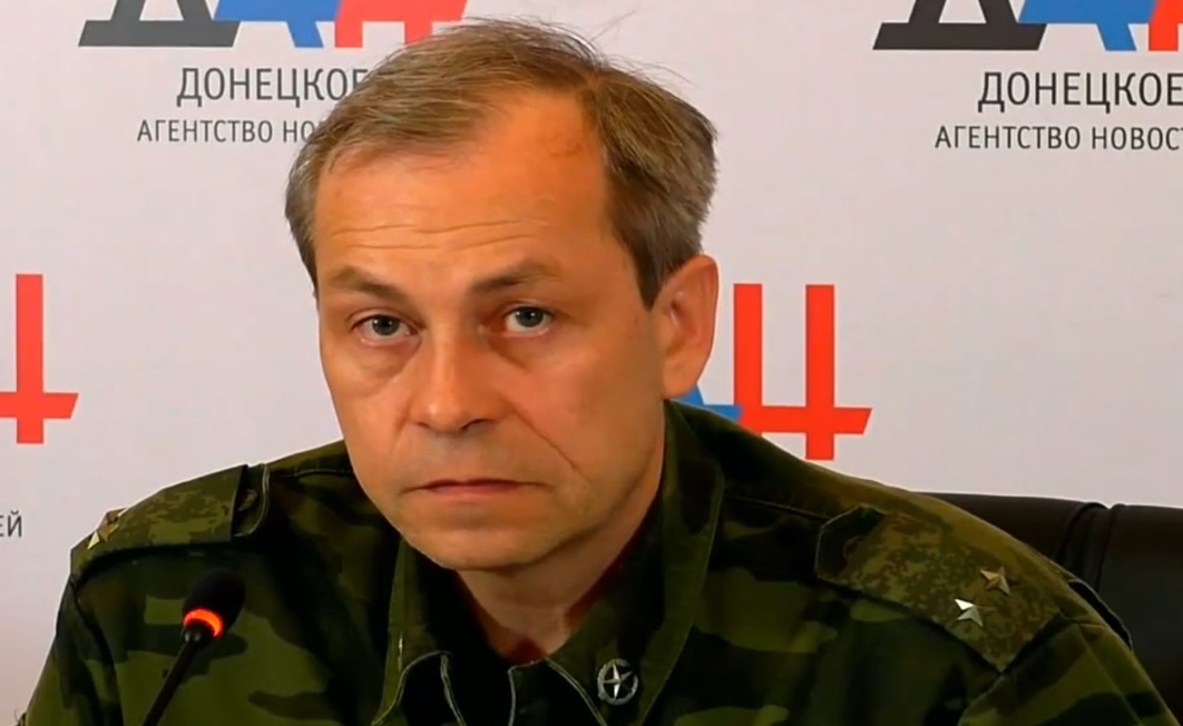 A picture containing text, person, person, military uniform
Description automatically generated