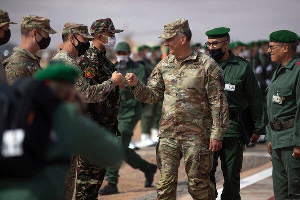 Gen. Stephen J. Townsend, center, lowered the level of authority to approve strikes to on-scene commanders, increasing the number of strikes.