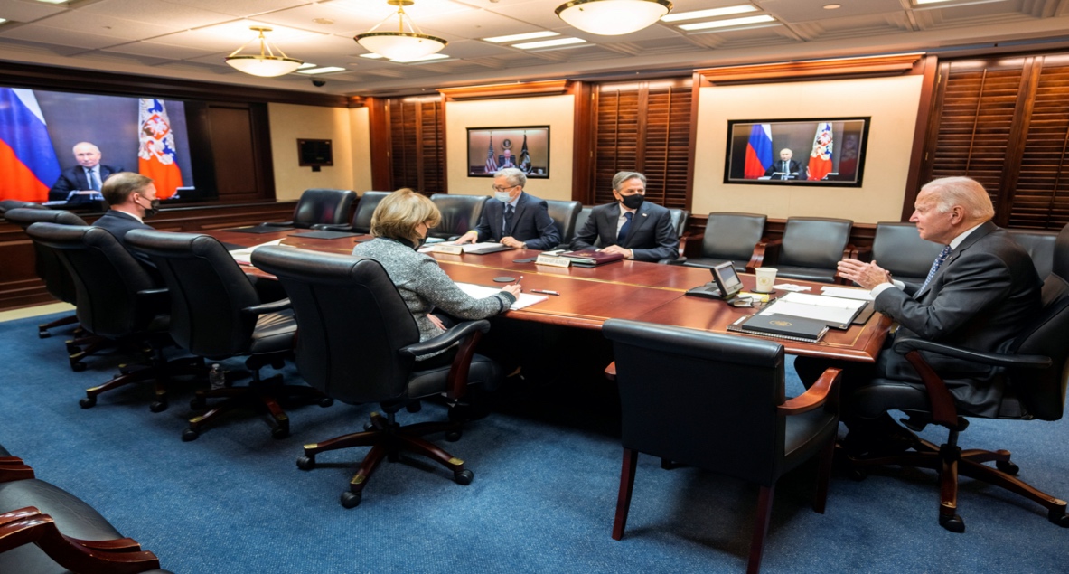 U.S. President Joe Biden holds virtual talks with Russia's President Vladimir Putin amid Western fears that Moscow plans to attack Ukraine, as Secretary of State Antony Blinken listens with other officials during a secure video call from the Situation Room at the White House in Washington, U.S., December 7, 2021. The White House/Handout via REUTERS