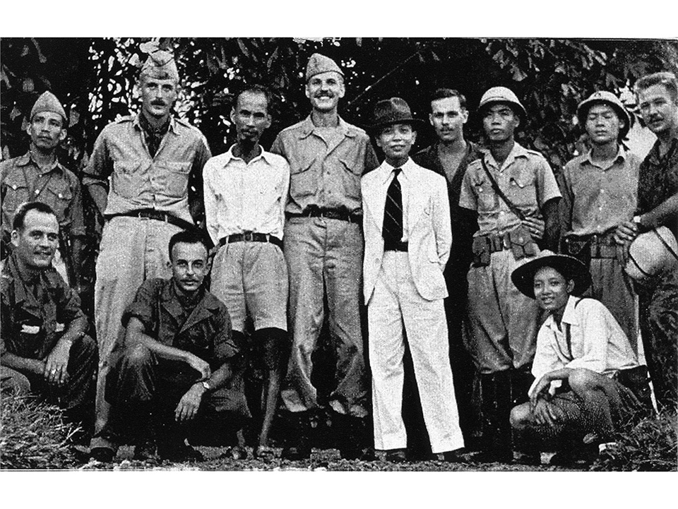 A group of people posing for a photo

Description automatically generated