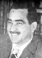 A person smiling for the camera

Description automatically generated with medium confidence