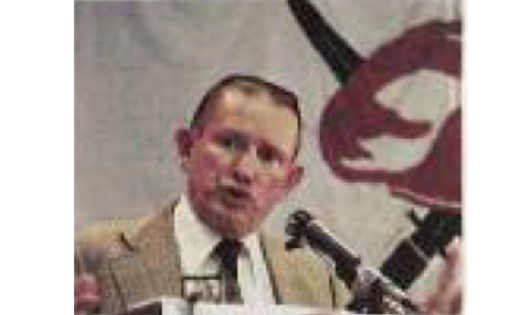 A person wearing a suit and tie

Description automatically generated with low confidence