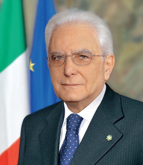 A person wearing glasses and a suit

Description automatically generated with medium confidence