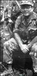 A picture containing text, person, military uniform, outdoor

Description automatically generated