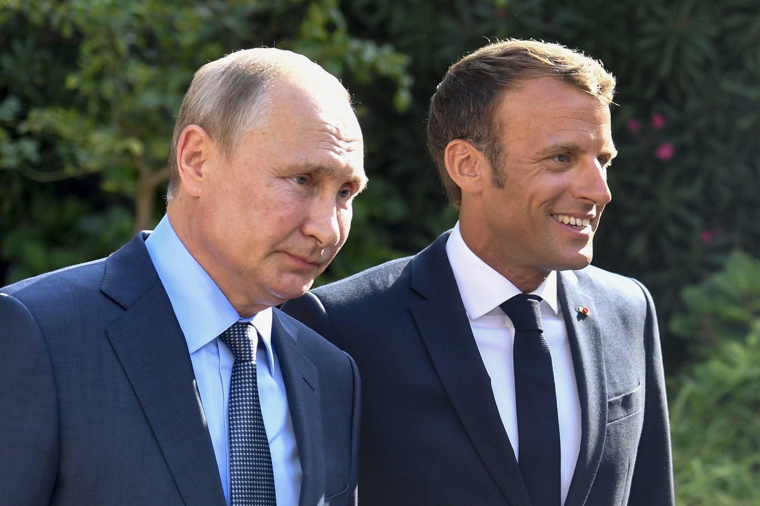 Putin, Macron hold French-Russian talks before G-7 | AP News