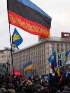 A group of people holding flags
Description automatically generated with medium confidence