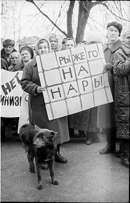 A group of people holding signs

Description automatically generated with medium confidence