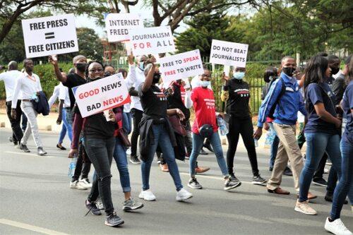 A group of people marching with signs

Description automatically generated with medium confidence