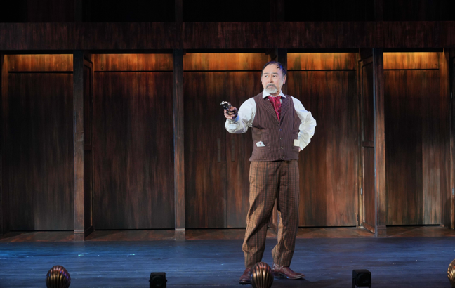 A person on a stage
Description automatically generated with medium confidence