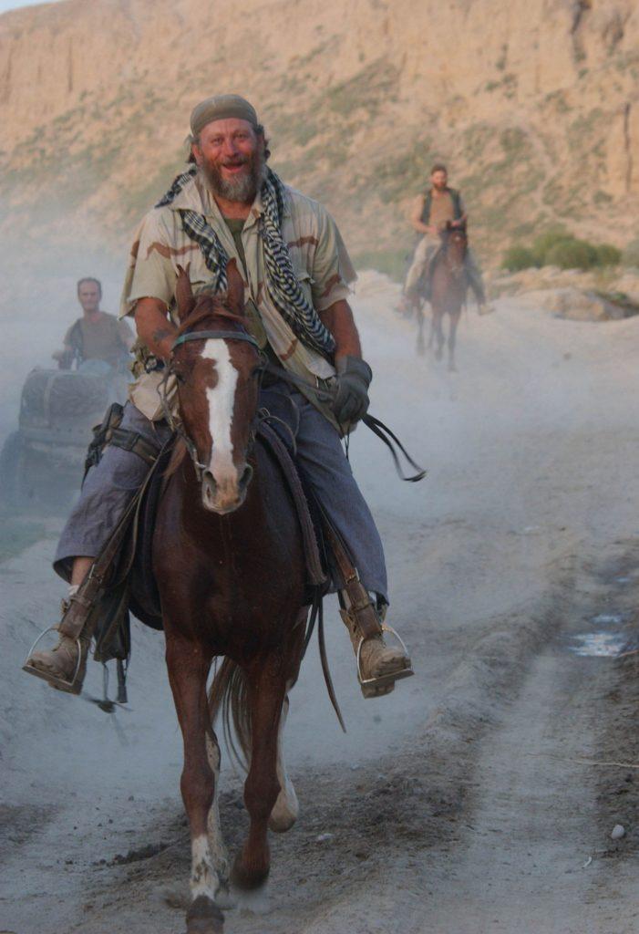 A person riding a horse
Description automatically generated with medium confidence