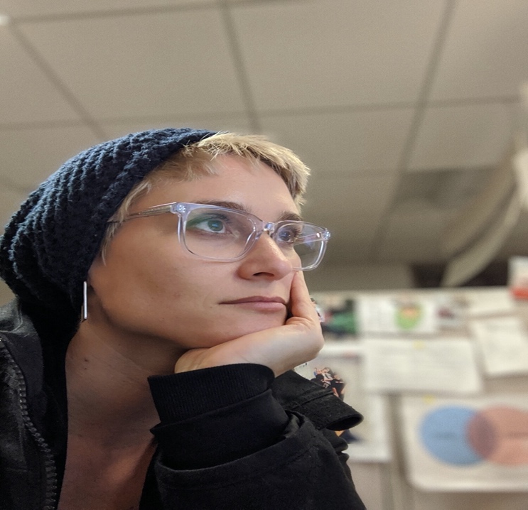 A person wearing glasses

Description automatically generated with low confidence