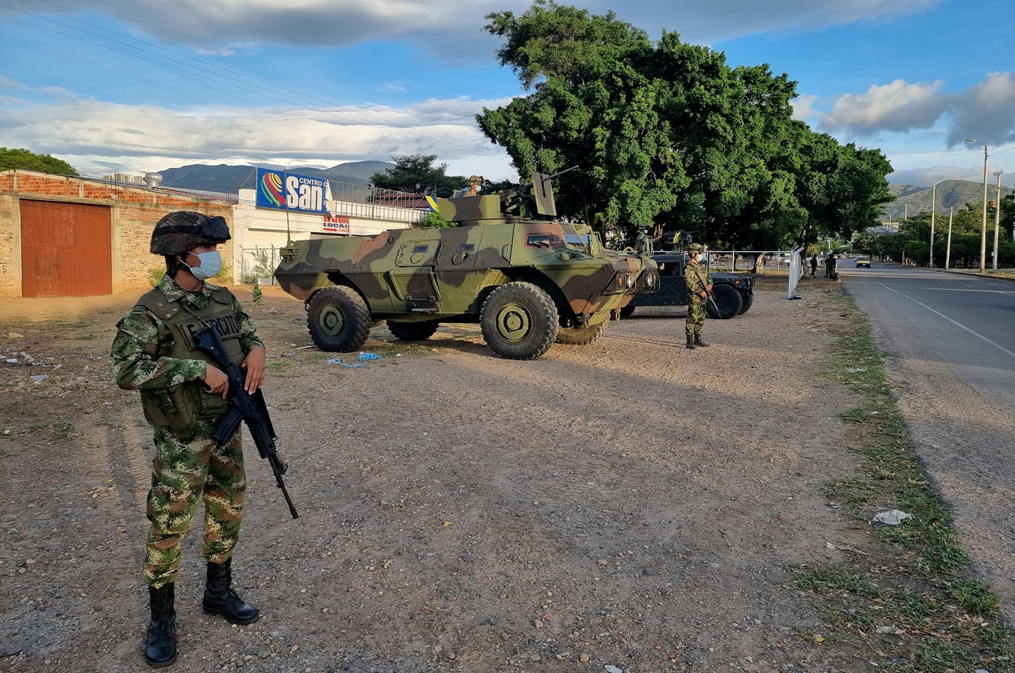 Members of the Colombian military patrol between Colombia and Venezuela by an unofficial crossing, as Venezuela reopens its borders with Colombia after a nearly three-year closure due to political tensions, in Cucuta, Colombia October 5, 2021. REUTERS/Luis Jaime Acosta