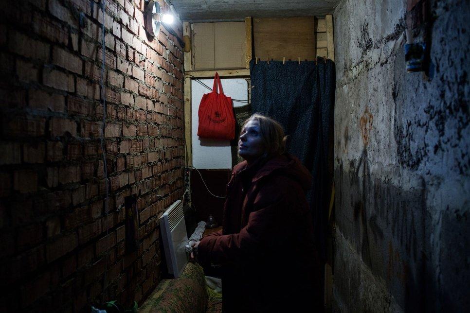 Oksana, 40, moved to her building's basement in Donetsk, Ukraine, when fighting broke out nearby last July. "I am really scared. I'm afraid of going out, of going anywhere."