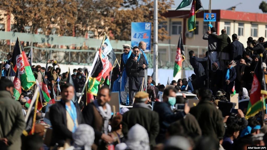 Supporters of presidential contender Abdullah Abdullah rally in Kabul on November 29.