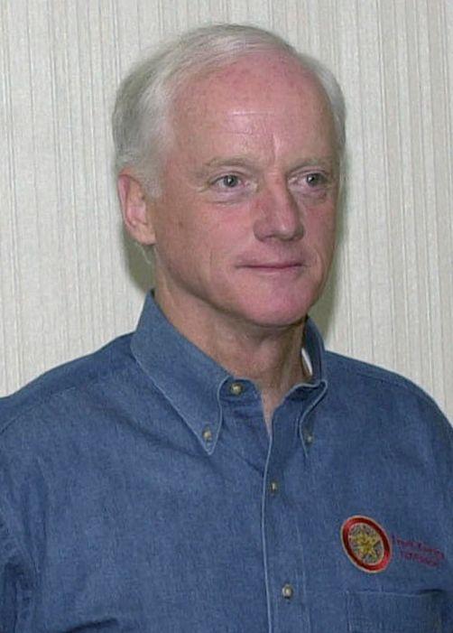 A person in a blue shirt

Description automatically generated with medium confidence