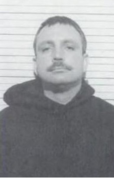 A person with a mustache

Description automatically generated with medium confidence