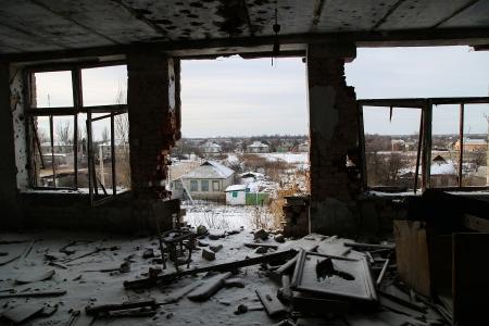 DONETSK REGION, UKRAINE - JANUARY 24, 2020: Inside a school in ruins in the village of Nikishyne near Debaltseve in the Donetsk People's Republic. Since the 2014-2015 shell attacks, the residents have been trying to recover from the calamity of war. For the time being, they have ten new households built, 133 partially damaged buildings renovated by volunteers and with assistance from the republican government, and 115 more houses in need of complete renovation. Valentin Sprinchak/TASS (Photo by Valentin SprinchakTASS via Getty Images)