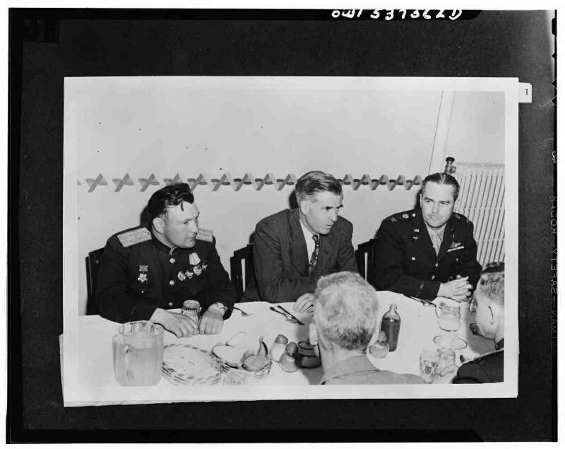 Fairbanks, Alaska. Vice President Henry A. Wallace, returning from China and Siberia, dining at Ladd Field with Russia and American airmen who fly lend-lease planes to Russia through the Alaskan wing of