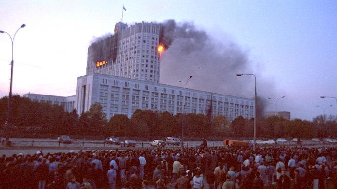 r/HistoryPorn - The Russian parliament building burns after being hit by tank-fire during the 1993 constitutional crisis [690x388]