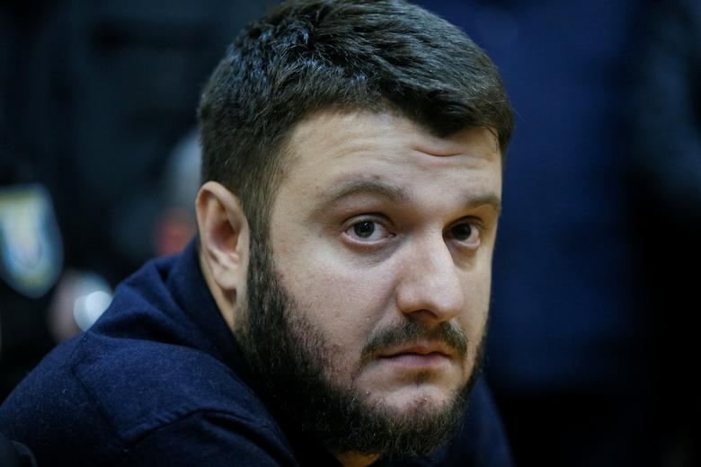 Son of Ukrainian Interior Minister Arsen Avakov, Oleksandr Avakov (L), who is under investigation over suspected corruption, attends a court hearing in Kiev, Ukraine November 1, 2017. REUTERS/Valentyn Ogirenko