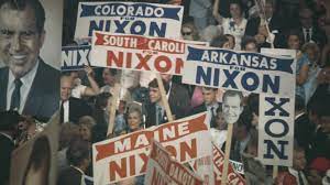 A group of people holding signs

Description automatically generated with medium confidence
