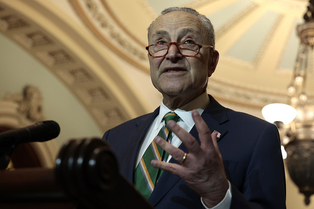 Senate Majority Leader Chuck Schumer speaks at a news conference.