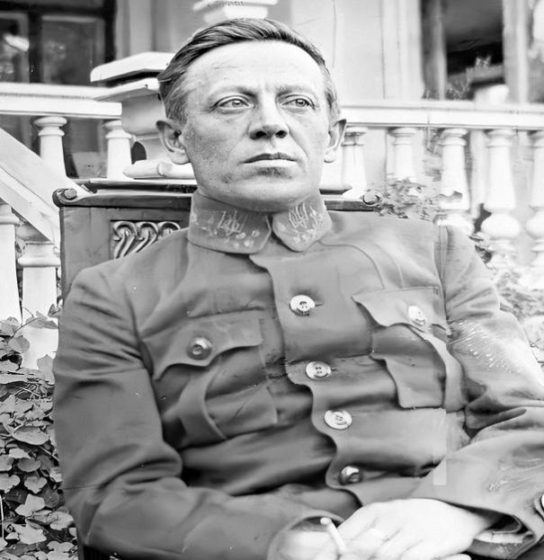A person in a military uniform

Description automatically generated with medium confidence