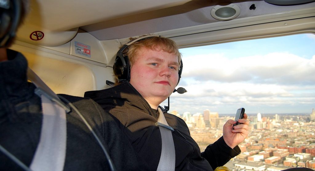 A person taking a selfie Description automatically generated with medium confidence