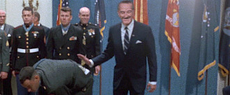 A picture containing person, suit, military uniform

Description automatically generated