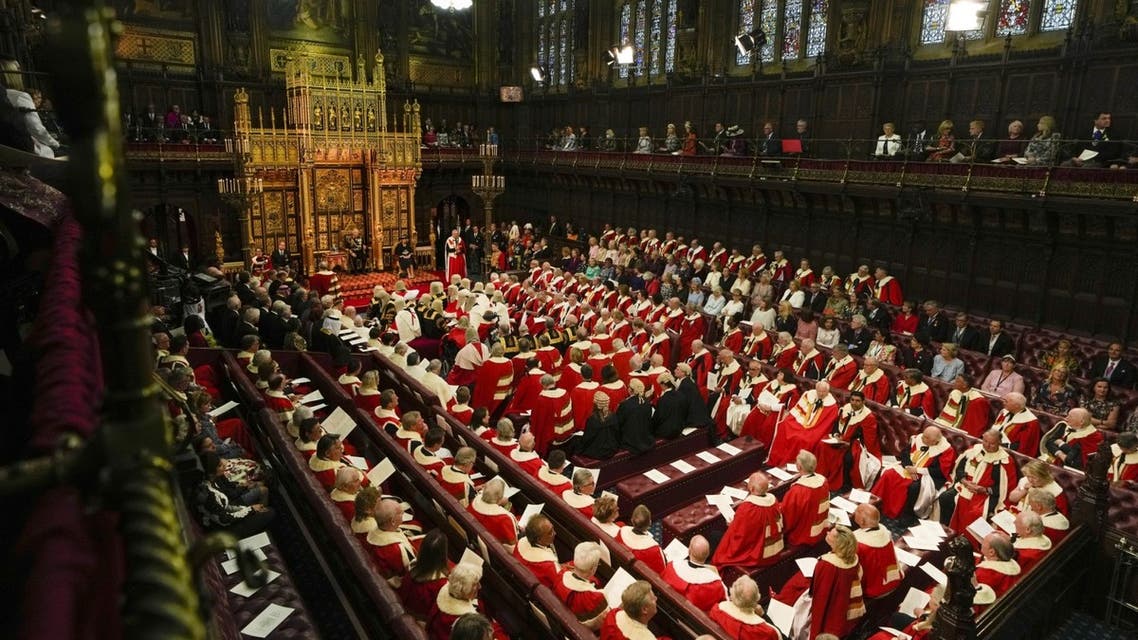 Britain's Prince Charles, Prince of Wales delivers the Queen's Speech in the House of Lords Chamber during the State Opening of Parliament at the Houses of Parliament, in London, on May 10, 2022. (AFP)