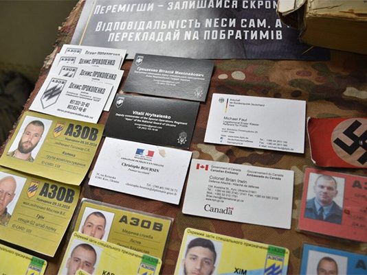 Business Cards of German and Canadian Government Officials Found in Abandoned Azov Battalion Headquarters in Mariupol