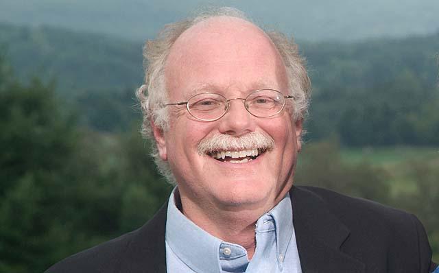 A person wearing glasses Description automatically generated with low confidence