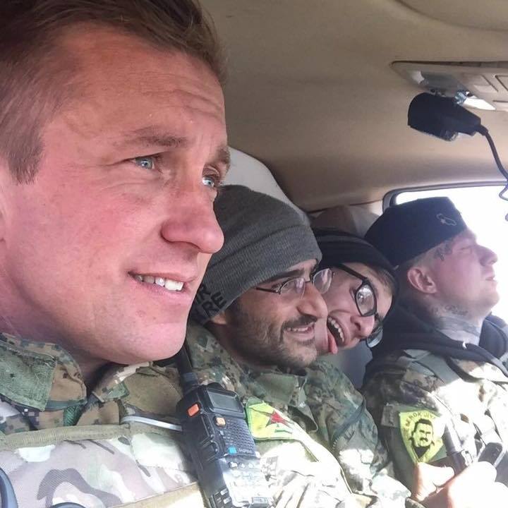 A group of men in military uniforms

Description automatically generated with low confidence