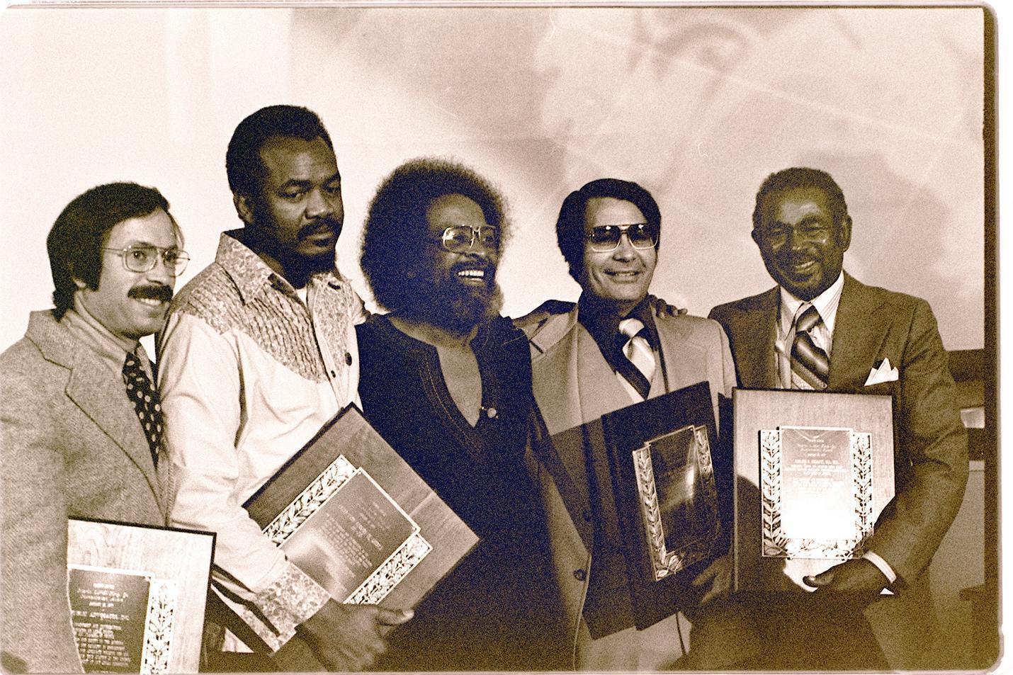 A group of people holding certificates
Description automatically generated with medium confidence