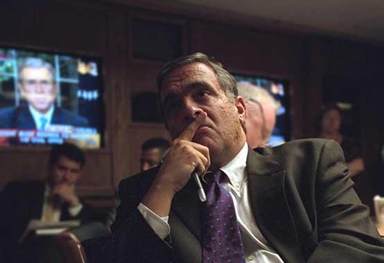 A person in a suit and tie

Description automatically generated with low confidence