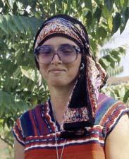 A person wearing a hat and glasses
Description automatically generated with low confidence