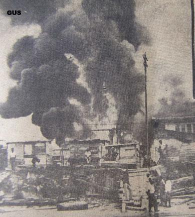 A picture containing text, train, steam, old
Description automatically generated