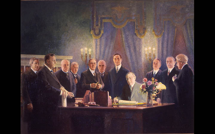 <p>President Wilson signing the Federal Reserve Act </p>