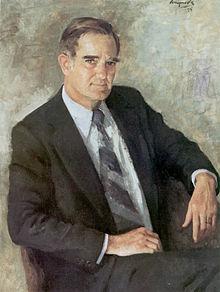 A person in a suit and tie

Description automatically generated with medium confidence