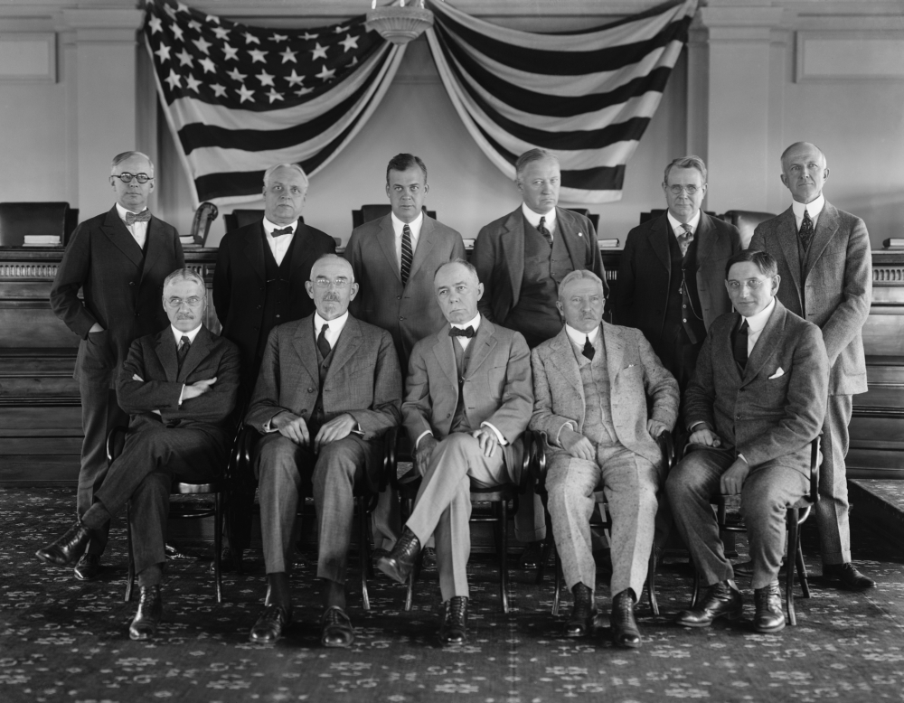 A group of men posing for a photo

Description automatically generated with medium confidence