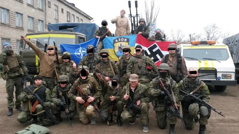 A group of people in uniform Description automatically generated with low confidence