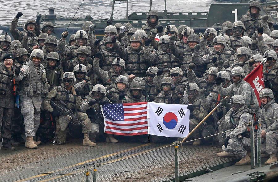A group of soldiers holding a flag

Description automatically generated with medium confidence