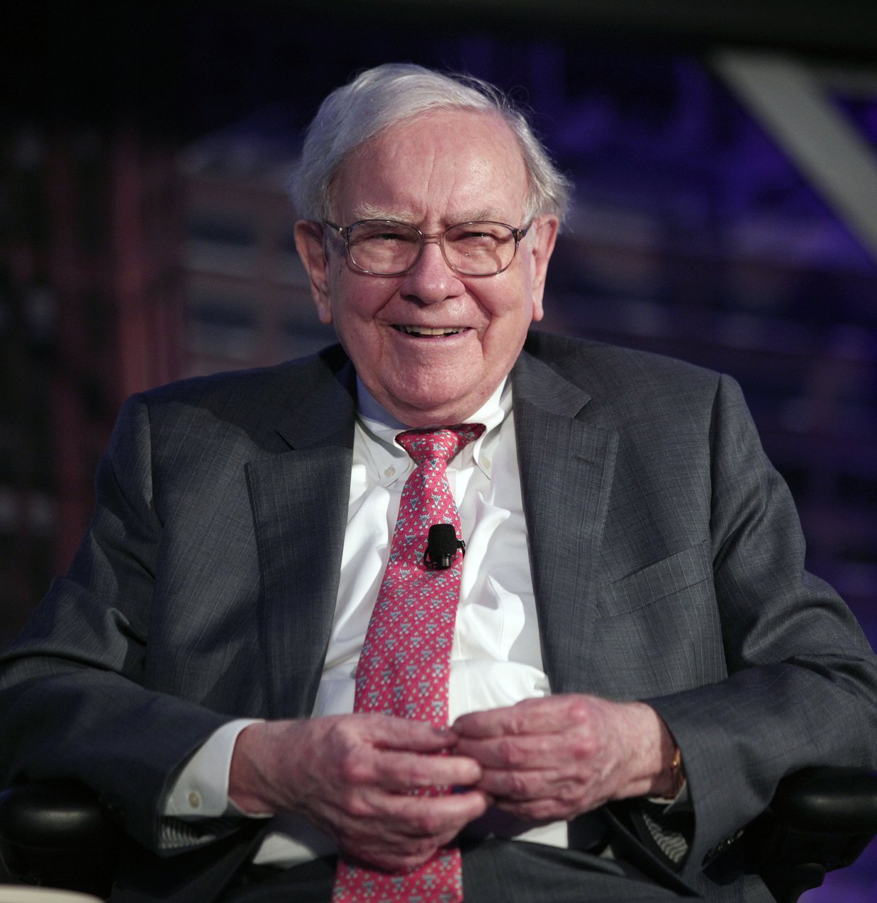 A person in a suit and tie

Description automatically generated with medium confidence