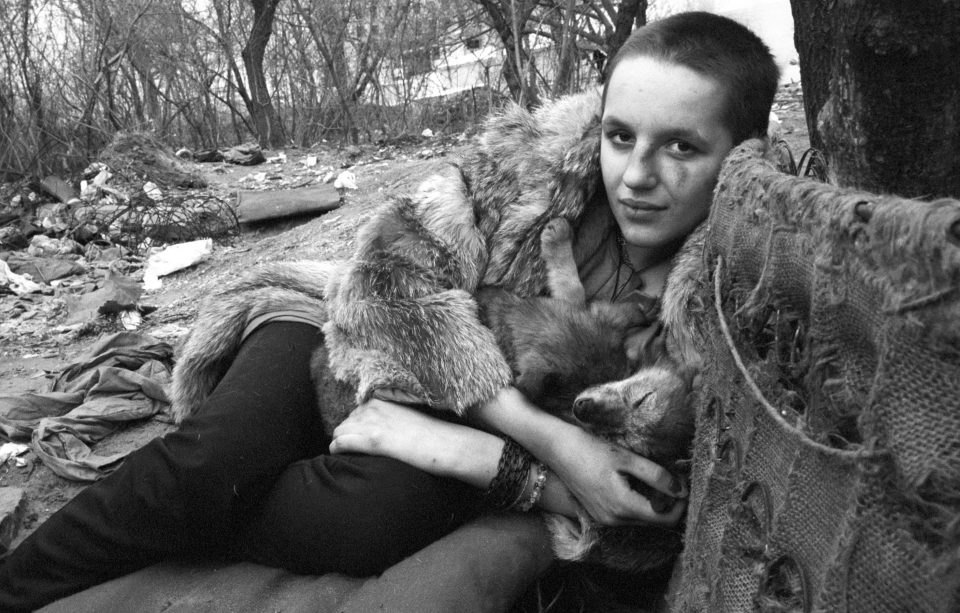 After being beaten up, 16-year-old Natasha relaxes after inhaling glue for the first time. She has turned to prostitution in Kiev to survive