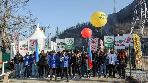 Azerbaijani demonstrators stage a protest, over what they claim is illegal mining, in the Lachin corridor, the breakaway Nagorno-Karabakh region's only land link with Armenia, on December 26, 2022. 