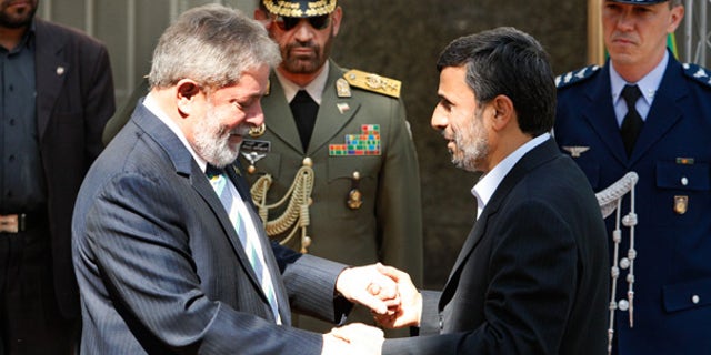 May 16: Iranian President Mahmoud Ahmadinejad, right, welcomes Brazilian President Luiz Inacio Lula da Silva in Tehran.