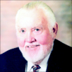 A person in a suit
Description automatically generated with low confidence