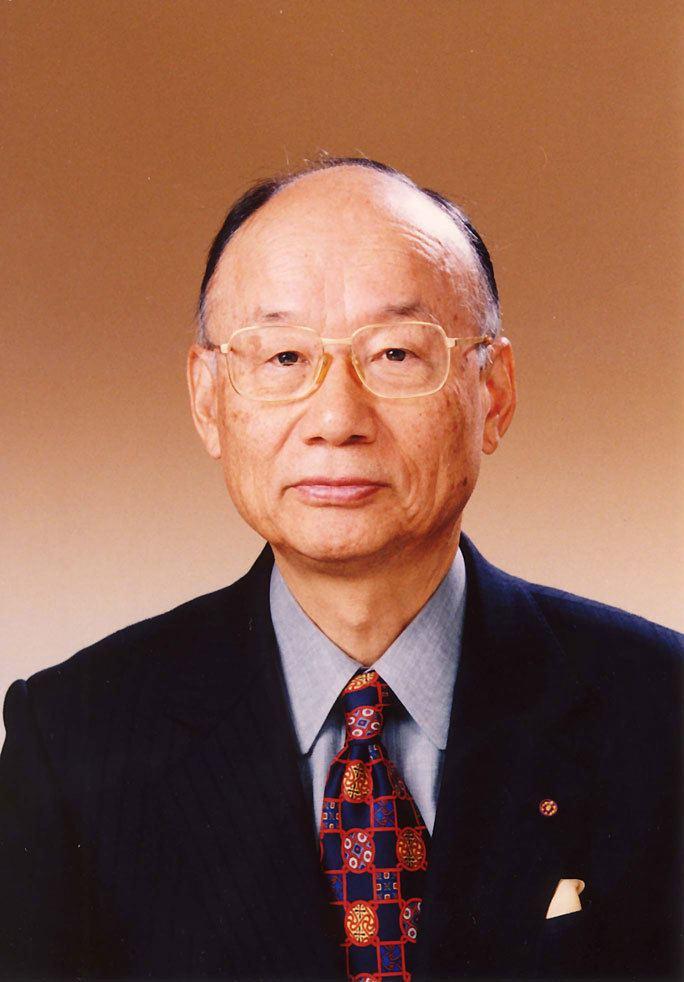 A person wearing glasses and a suit

Description automatically generated with medium confidence